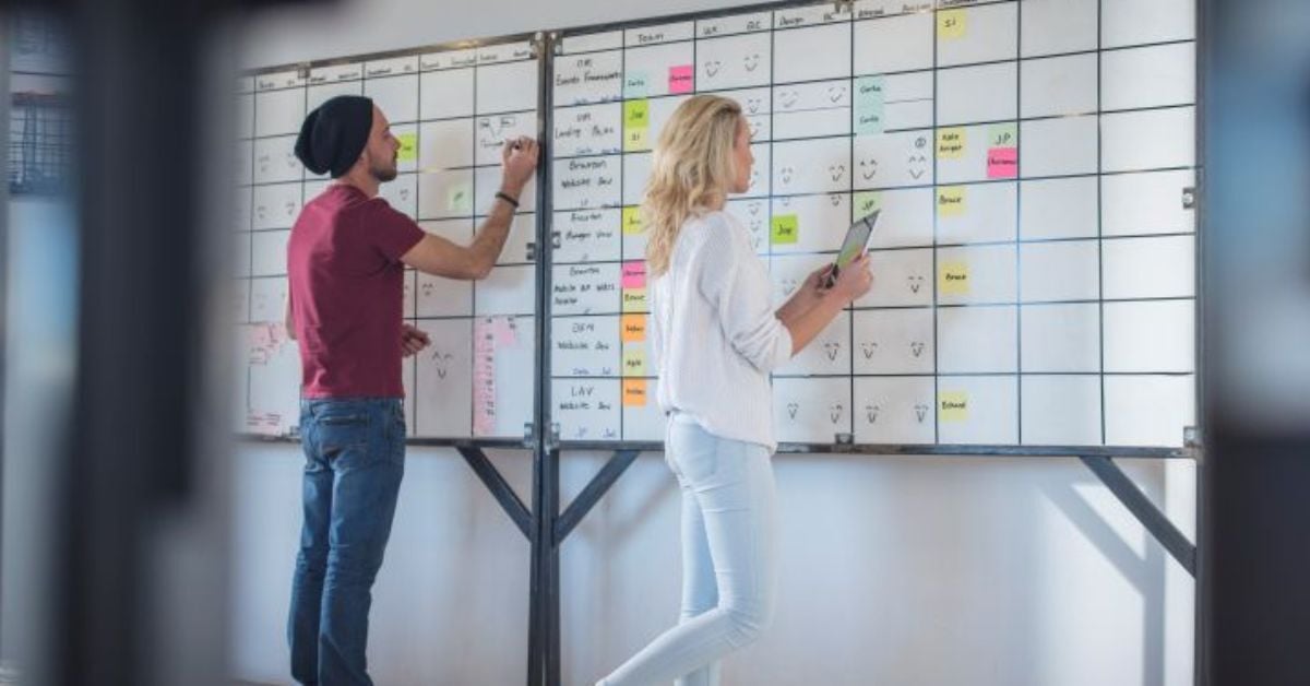 two-professionals-collaborating-at-a-whiteboard-wi-2026-01-09-09-53-14-utc v2